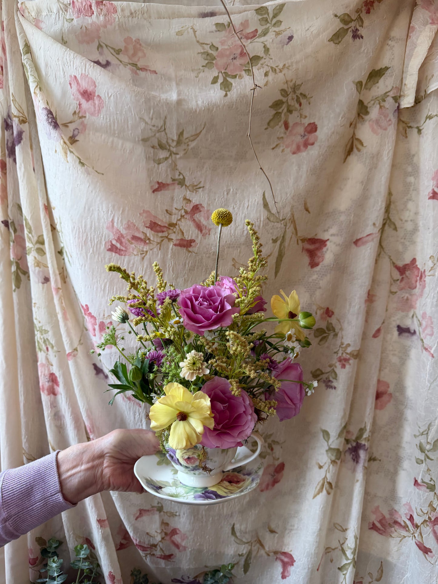 tea cup vased arrangement